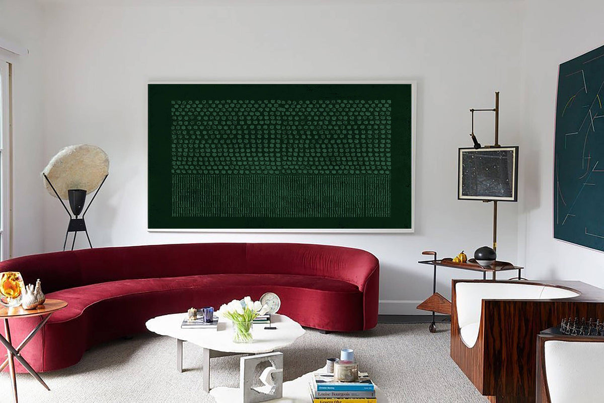 May include: A large rectangular wall art piece featuring a dark green background with a pattern of small light green dots on the top half and vertical lines on the bottom half, framed in a thin white border and mounted on a plain white wall.