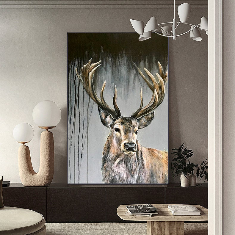 May include: A painting of a large, brown deer with large antlers. The deer is looking directly at the viewer. The background is a dark gray with black streaks.
