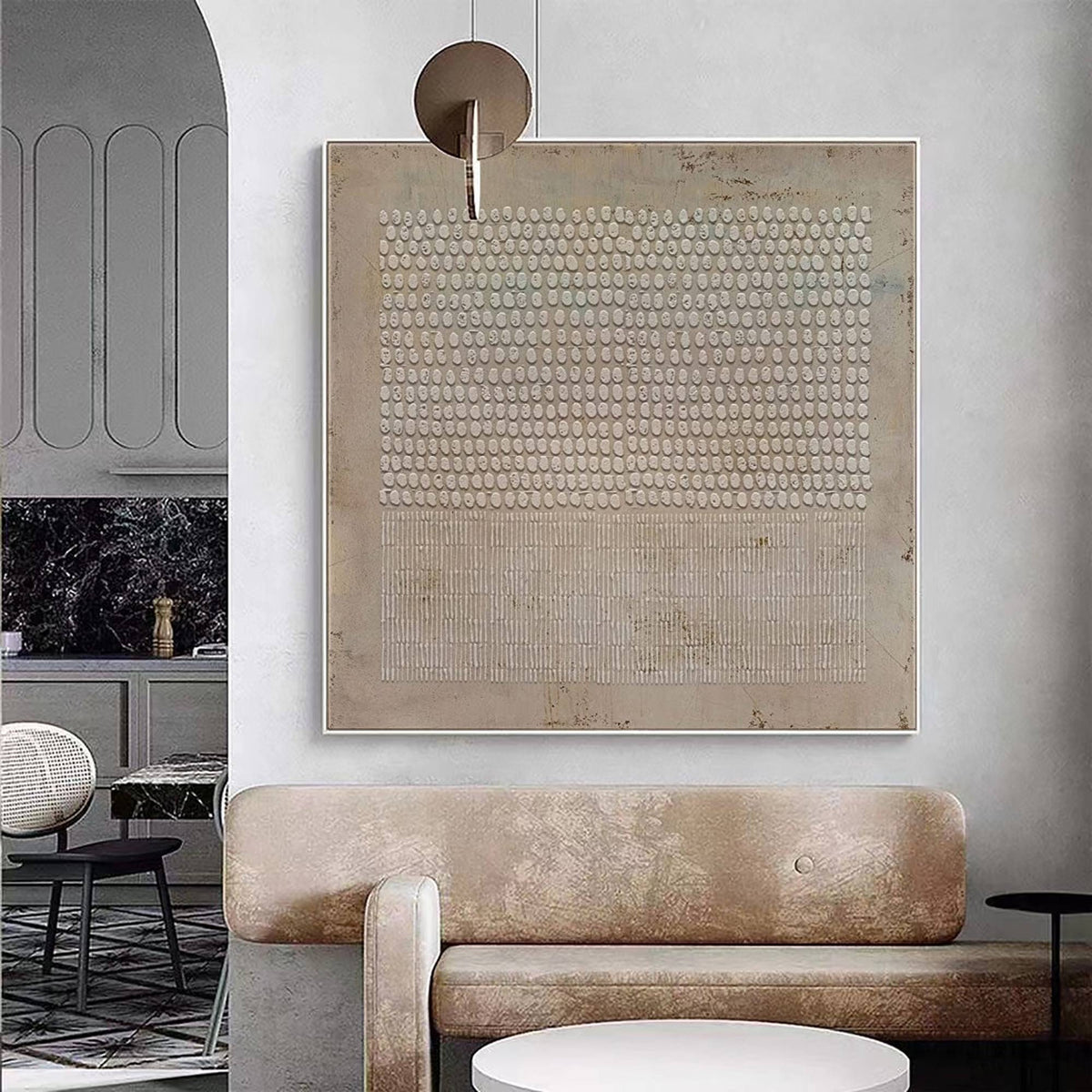 May include: Abstract art print with a beige background and a pattern of small white circles and lines. The print is framed and hanging on a wall.