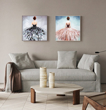 May include: Two framed paintings of women in flowing dresses. The woman in the left painting is wearing a black dress with a gray background. The woman in the right painting is wearing a pink dress with a blue background.