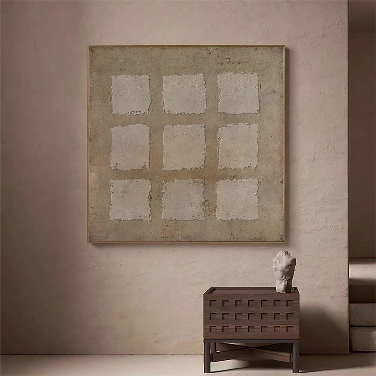 May include: A framed abstract painting with a textured, beige background and nine white squares arranged in a grid pattern.