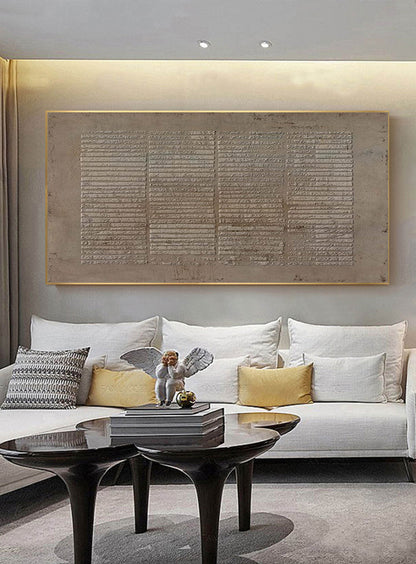 May include: A modern living room interior with a white sofa, two coffee tables, and a decorative angel figurine. A large abstract painting with a textured, gray and brown color scheme hangs on the wall above the sofa.