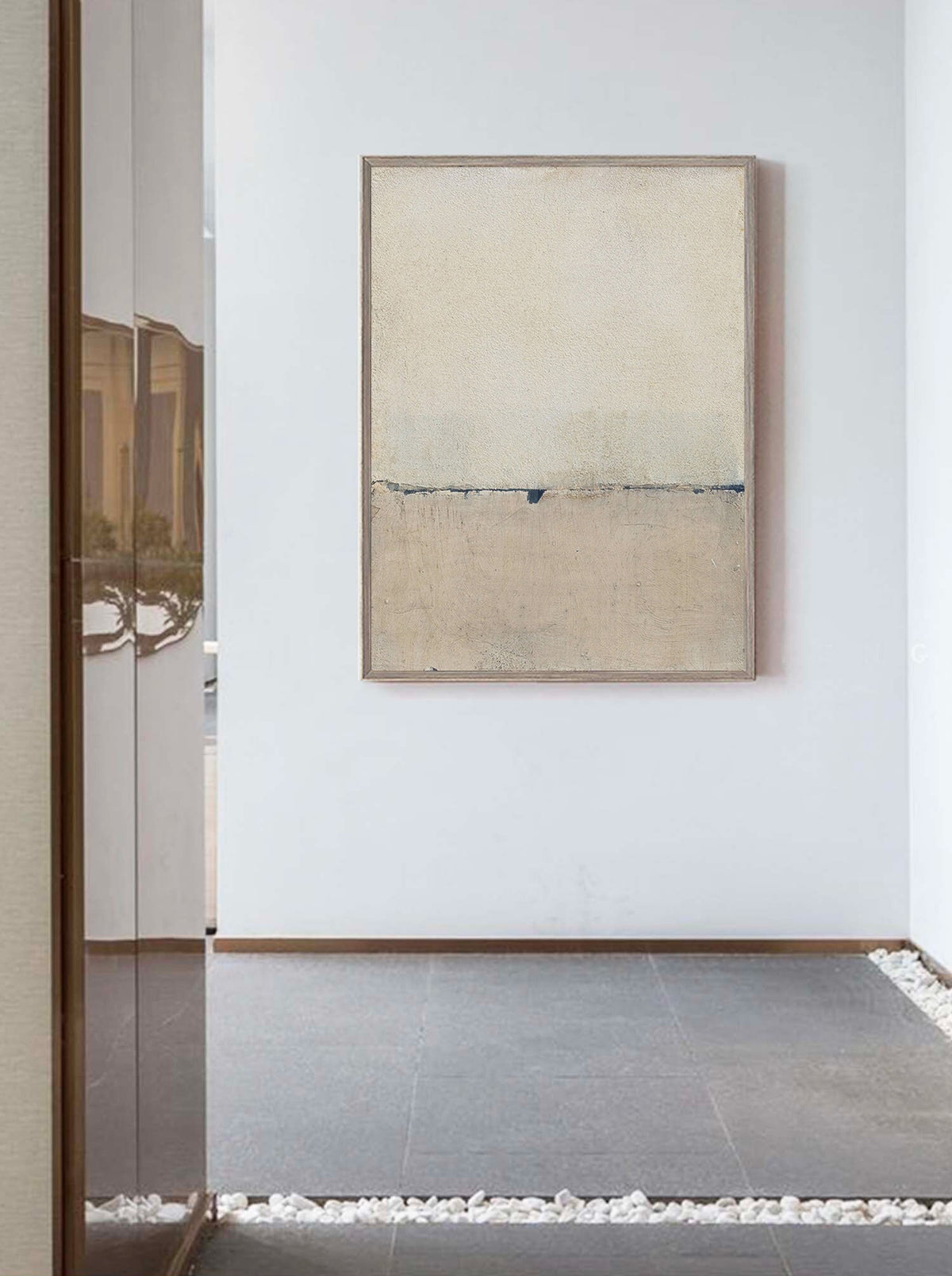 May include: Abstract painting with a horizontal line dividing the canvas into two sections. The top section is a light beige color, while the bottom section is a darker beige color. The line is a dark blue color and is slightly uneven.