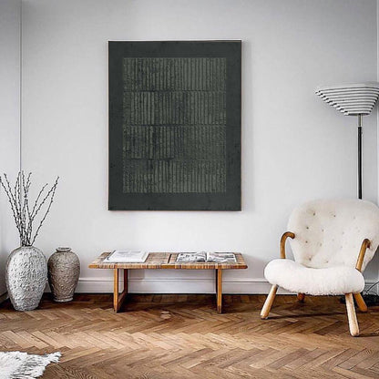 May include: A dark gray abstract artwork with vertical lines hangs above a wooden bench. The room features a white chair with a cream-colored cushion and wooden legs, a floor lamp, and decorative vases. The floor is made of wood.