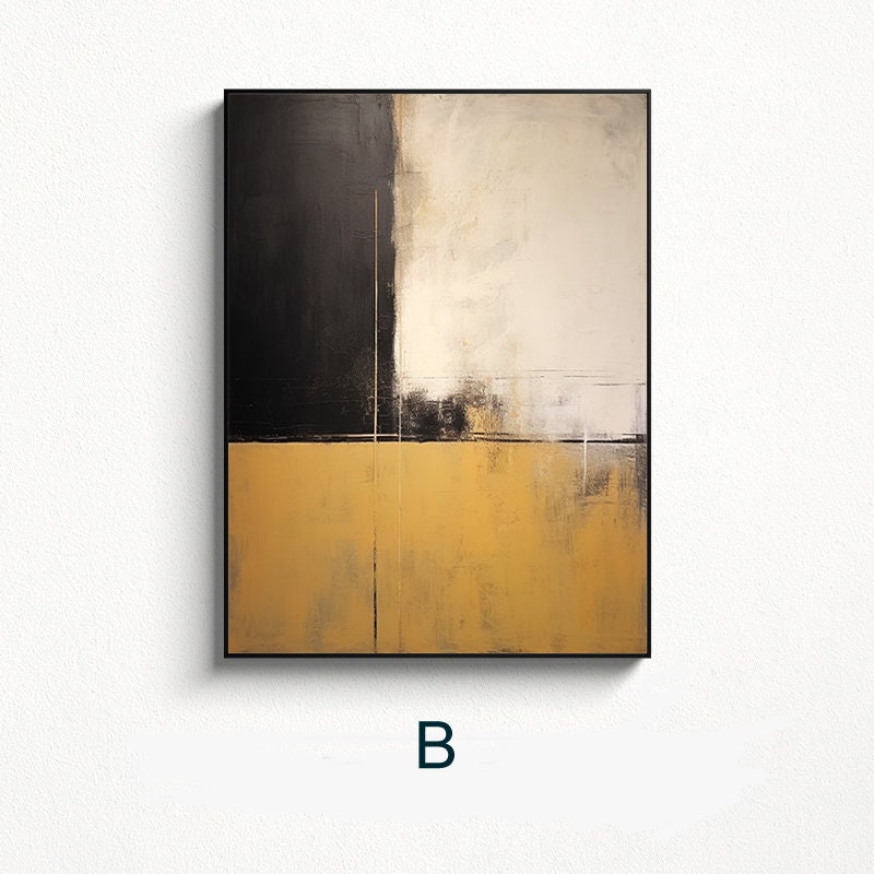 May include: Abstract painting with black, white, and gold geometric shapes. The painting is framed in black.