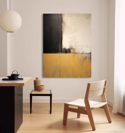 May include: Abstract painting with black, white, and gold paint. The painting is divided into three sections, with the top section being white, the middle section being black, and the bottom section being gold.