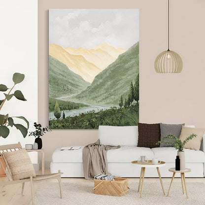 May include: A painting of a mountain landscape with a river winding through the valley. The mountains are painted in shades of green and yellow, with a light blue sky above. The painting is framed and hanging on a wall in a living room.
