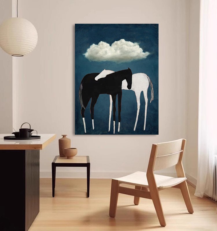 May include: A painting of two horses, one black and one white, standing side by side against a blue background with a white cloud above them.