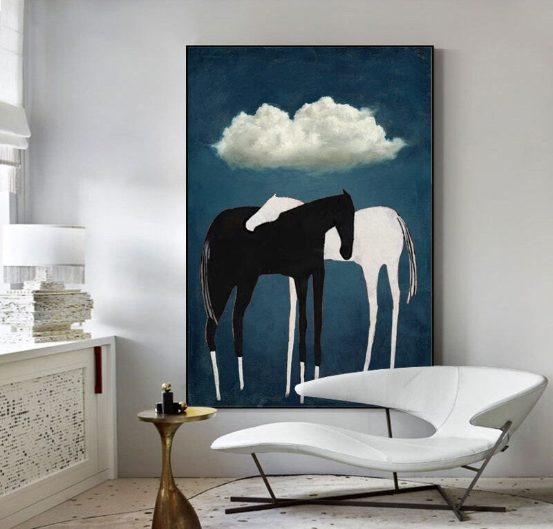 May include: Abstract painting of two horses, one black and one white, standing side by side against a blue background with a white cloud above them.