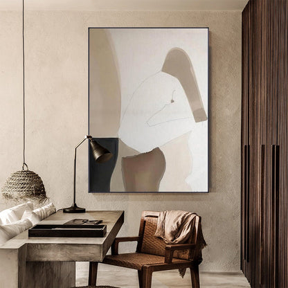 May include: Abstract painting of a person in a seated pose, with muted tones of brown, beige, and white. The painting is framed and hanging on a wall in a modern interior.