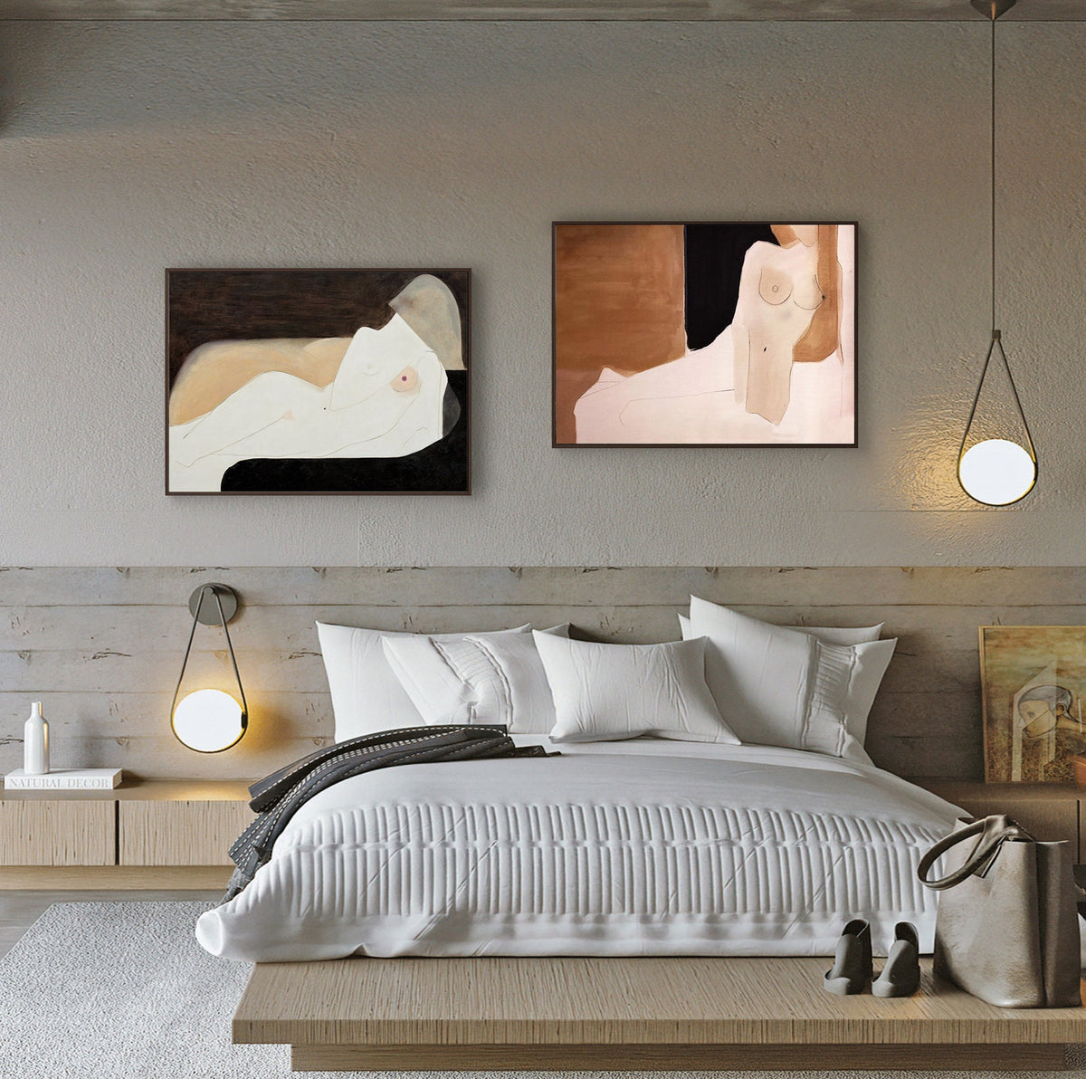 May include: Two abstract paintings of nude figures in a bedroom setting. The paintings are framed and hung on a light gray wall above a white bed with a white duvet and white pillows. There is a wooden nightstand with a lamp on the left side of the bed.