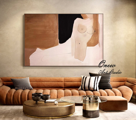 May include: Abstract painting of a nude figure in shades of brown, pink, and black. The figure is reclining on a white surface. The painting is framed and hanging on a wall.