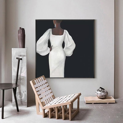 May include: A black and white painting of a woman wearing a white dress with large, puffy sleeves. The woman is standing with her back to the viewer and her hand on her hip. The painting is framed and hanging on a white wall.