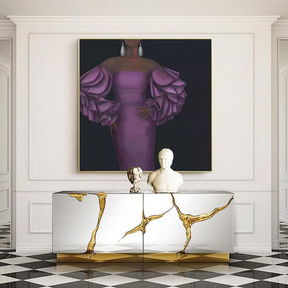 May include: A gold-accented mirrored console table with a white marble-like design. The table is decorated with a bust of a person and a decorative object. A painting of a woman in a purple dress with large ruffled sleeves hangs above the table.
