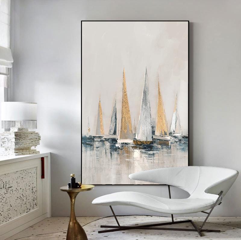 May include: Abstract painting of sailboats on a body of water with a light blue, white, and gold color scheme.