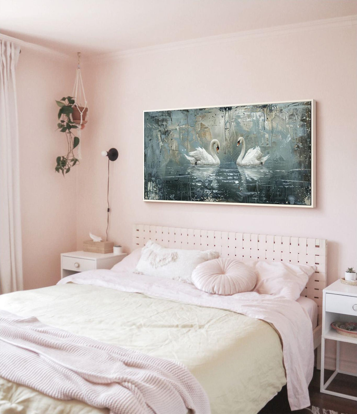 May include: A white bed with a white wicker headboard and a pink blanket. A painting of two white swans on a blue background hangs above the bed.