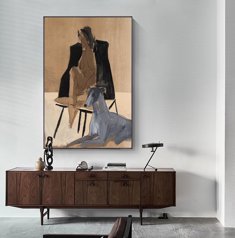 May include: A painting of a nude woman sitting on a chair with a dog lying beside her. The woman is wearing a black jacket and the dog is a light blue color. The painting is set against a beige background.