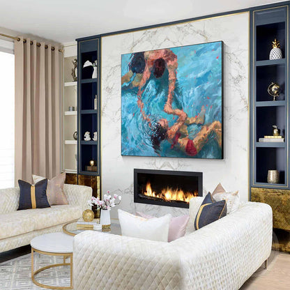 May include: A painting of three people swimming in a blue ocean. The painting is in a modern living room with a white fireplace and a white couch.