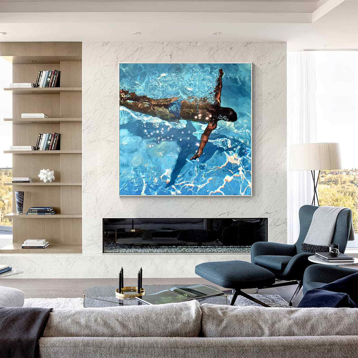 May include: A large framed painting depicts a swimmer underwater in a pool. The artwork features a person with dark skin, wearing blue swim trunks, and swimming with one arm extended. The water is a vibrant blue with light reflections.