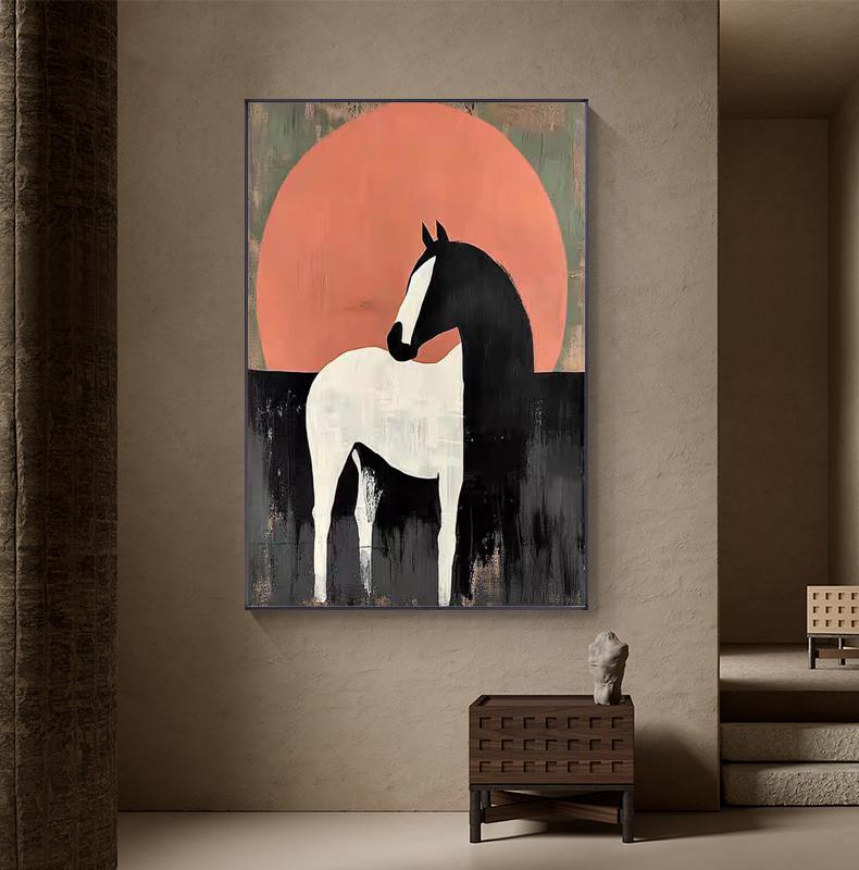May include: Abstract art print of a horse. The horse is depicted in black and white against a backdrop of a large orange circle, suggesting a sunset. The artwork has a textured, painted appearance, with a dark, brushstroke-like base.