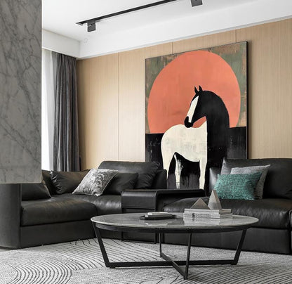 May include: A modern living room featuring a large abstract painting of a horse against a red sun. The room includes a black leather sofa, a round coffee table, and a patterned rug. The artwork is the focal point of the room.