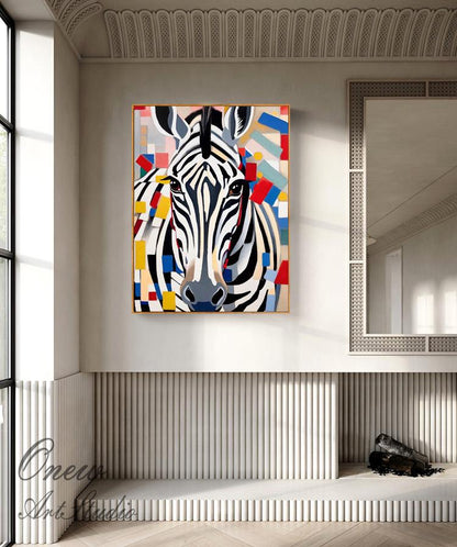 May include: A framed canvas art print of a zebra's head with a colorful geometric background. The zebra has black and white stripes, with a gray nose and brown eyes. The background features red, blue, yellow, and white shapes.