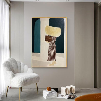 May include: An abstract painting with a gold frame depicts a figure carrying vessels. The figure wears a striped dress and carries a large, light-yellow object on their head and a brown object in their arms. The background features teal and white archways.