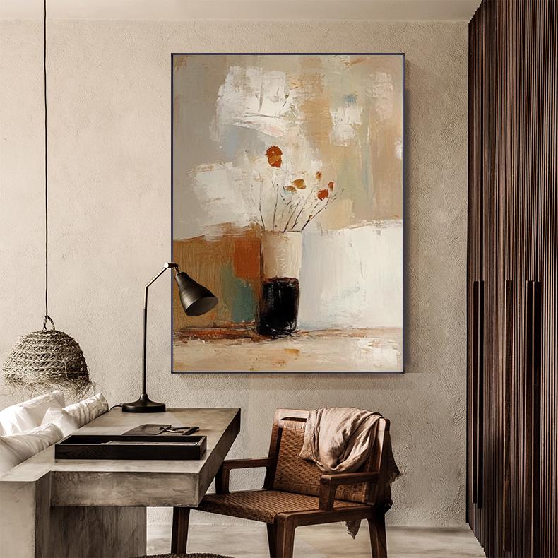 May include: Abstract oil painting featuring a still life with vases and flowers. The artwork uses a neutral color palette with shades of beige, brown, and white. The painting is displayed on a wall in a room with a desk, lamp, and chair.
