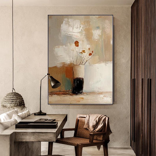 May include: Abstract oil painting featuring a still life with vases and flowers. The artwork uses a neutral color palette with shades of beige, brown, and white. The painting is displayed on a wall in a room with a desk, lamp, and chair.