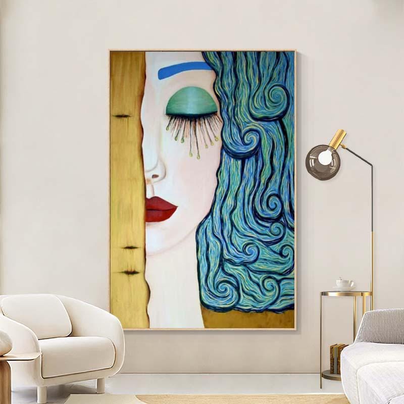 May include: A large framed painting featuring a woman's face with one eye closed. The woman has blue hair, a red lip, and a teal eye shadow. The painting is in a gold frame and is displayed in a living room.