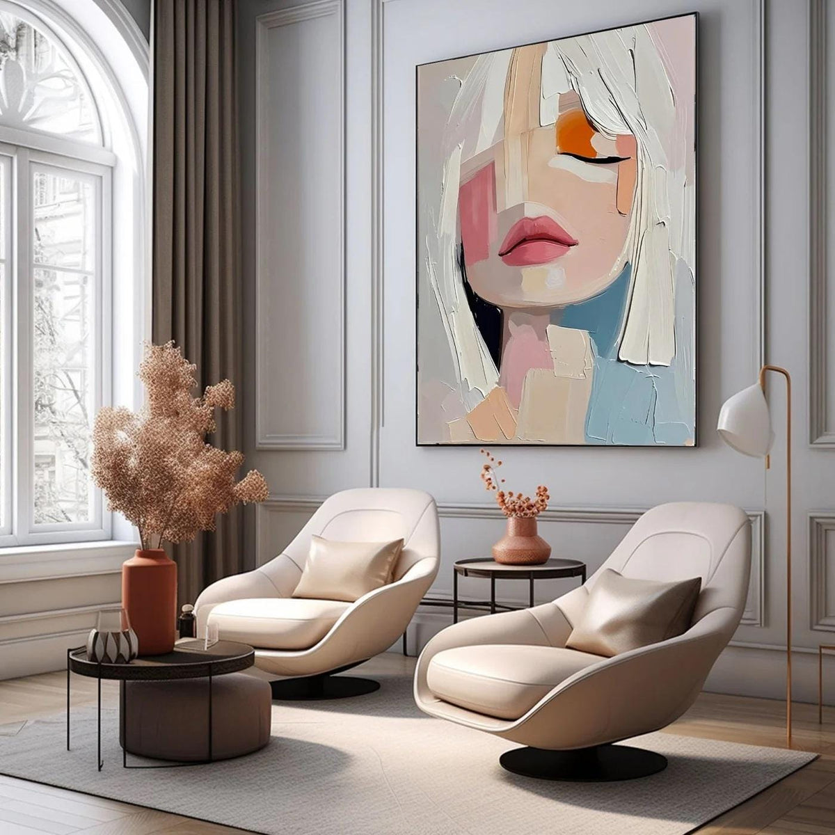 May include: An abstract painting of a woman's face with closed eyes, featuring white hair and a palette of pink, orange, and blue. The artwork hangs above two cream-colored swivel chairs in a modern living room setting.