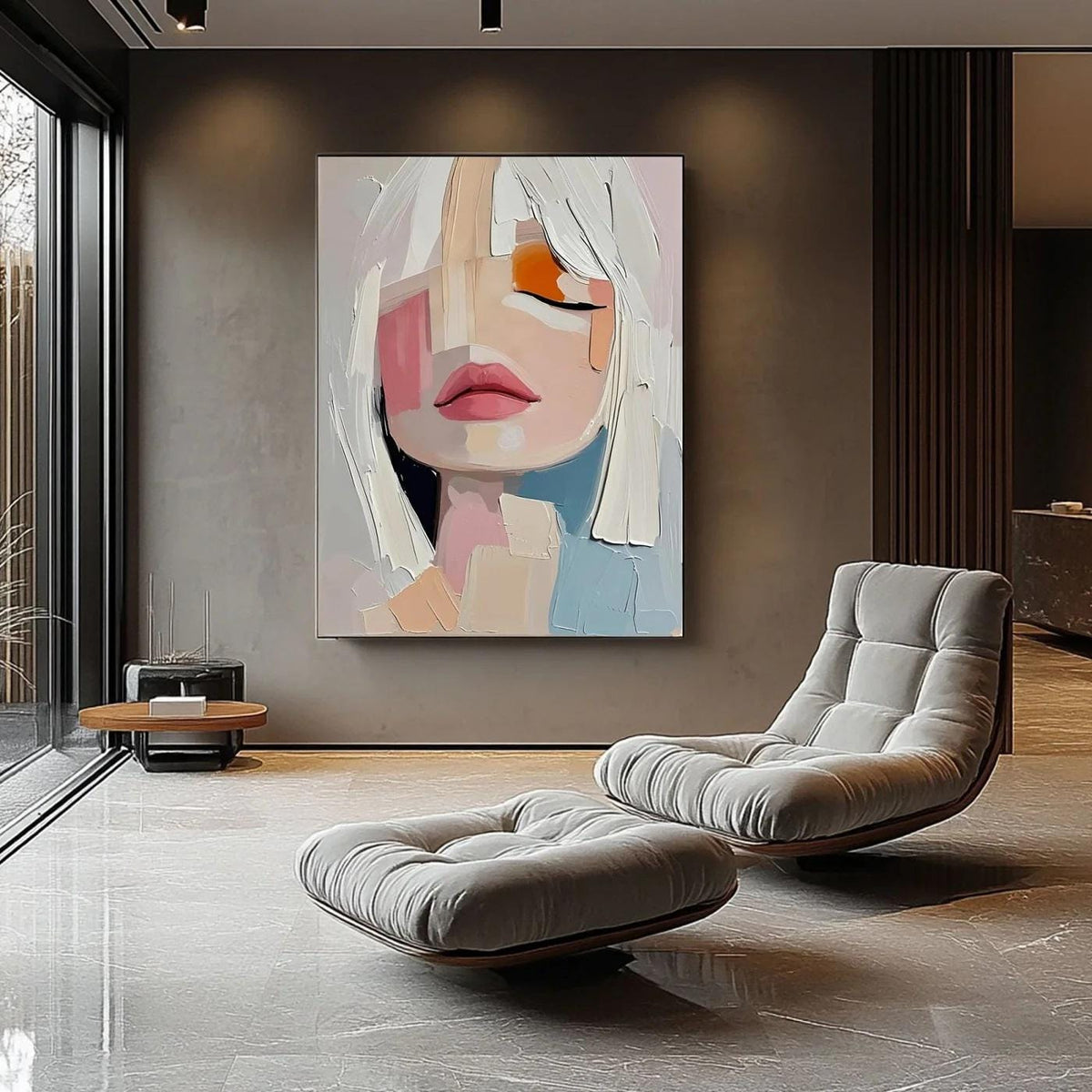 May include: Abstract portrait painting of a woman with closed eyes, featuring a palette of pink, orange, and blue. The artwork has a textured, brushstroke style, with white hair and a soft, neutral background. The painting is displayed in a modern living space.