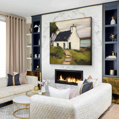 May include: A rectangular oil painting featuring a white cottage with a dark roof, a stone path, and green foliage, displayed on a white marble wall above a fireplace. The artwork uses visible brushstrokes to depict a landscape scene.