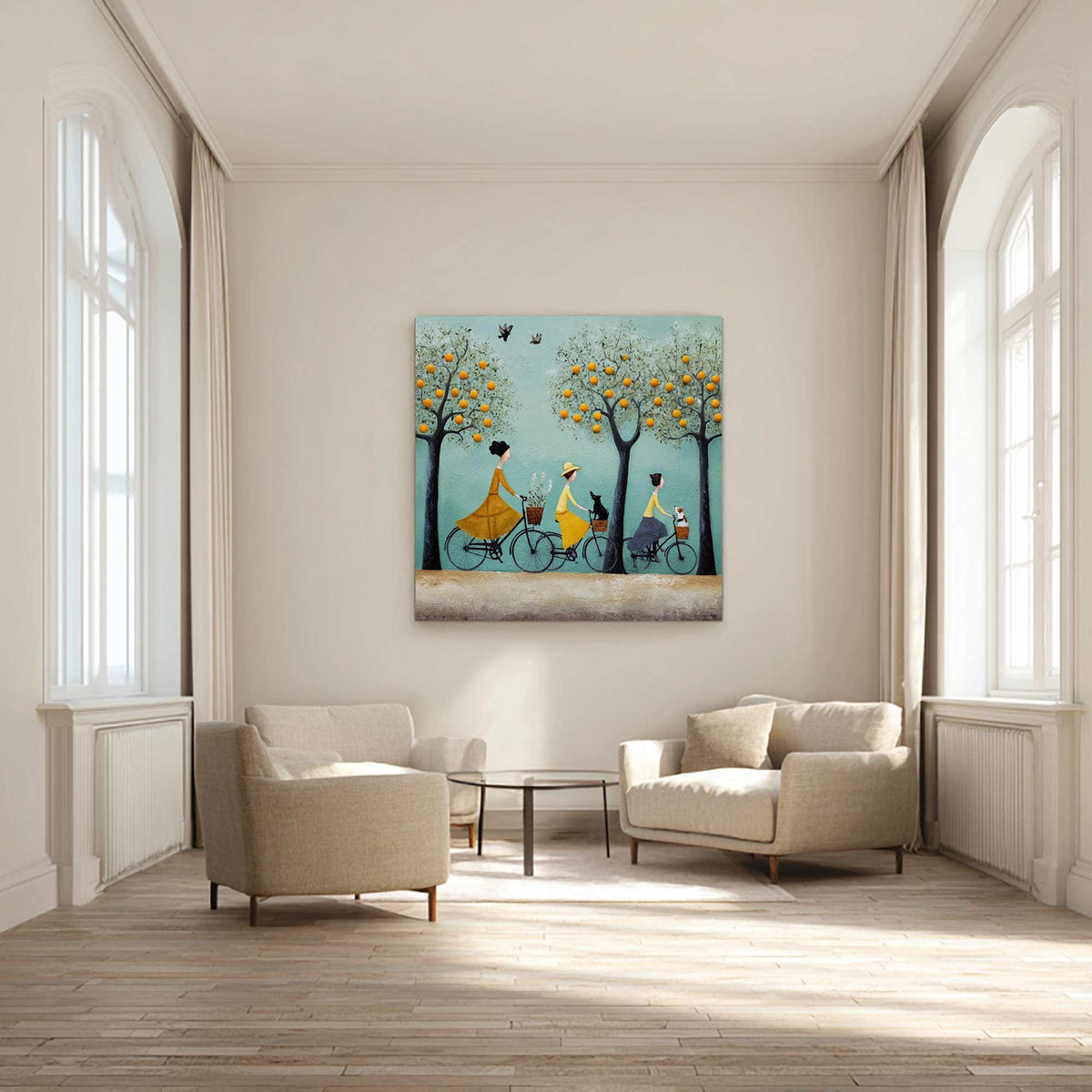 May include: A square canvas art piece depicts three figures riding bicycles beneath trees with yellow fruit. The figures wear yellow dresses and hats, with a black cat and a dog in baskets. The background is a light blue with birds.