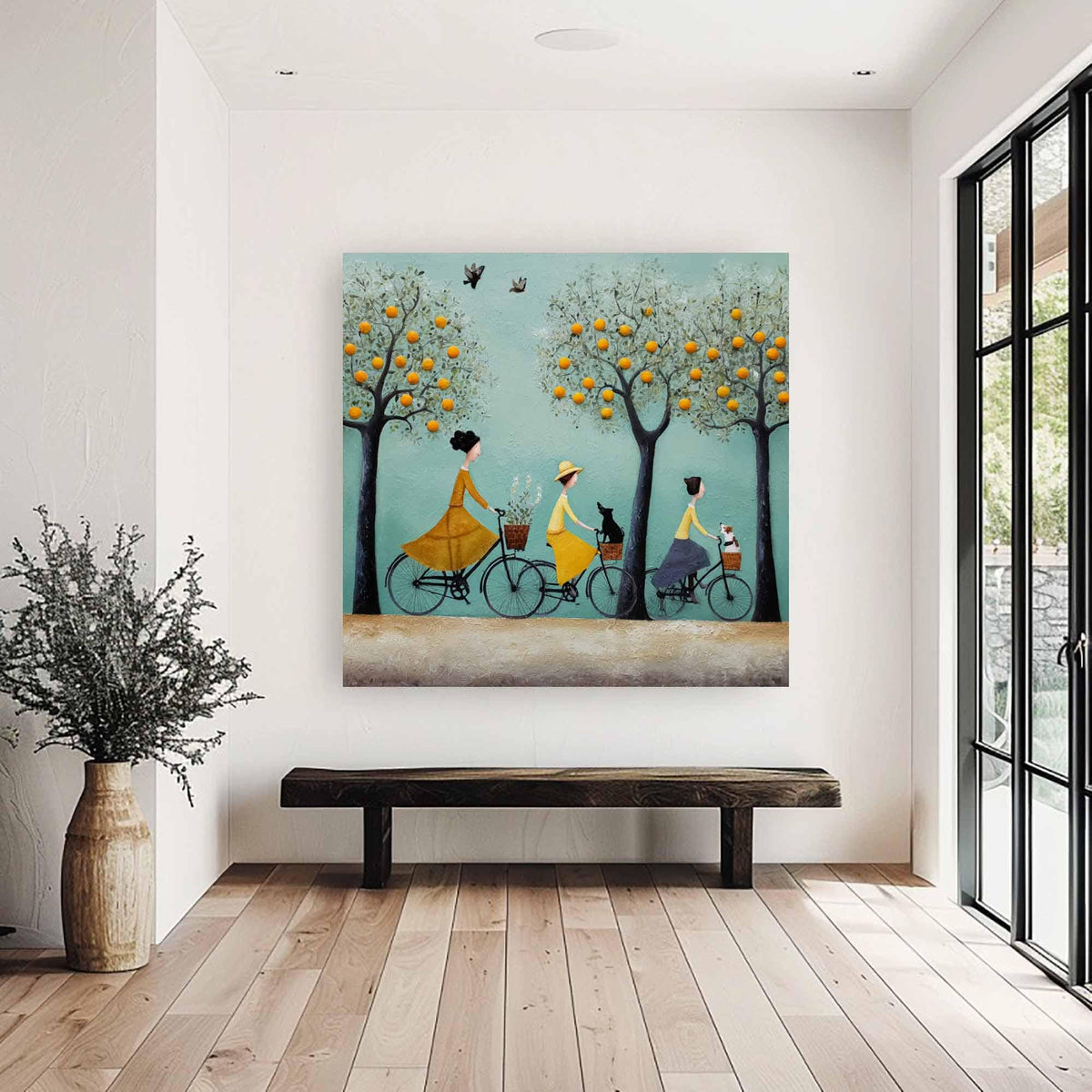 May include: A whimsical painting depicts three figures riding bicycles along a path. The figures, dressed in yellow and blue, are accompanied by a black cat and a small dog. Orange-laden trees line the path under a light blue sky.