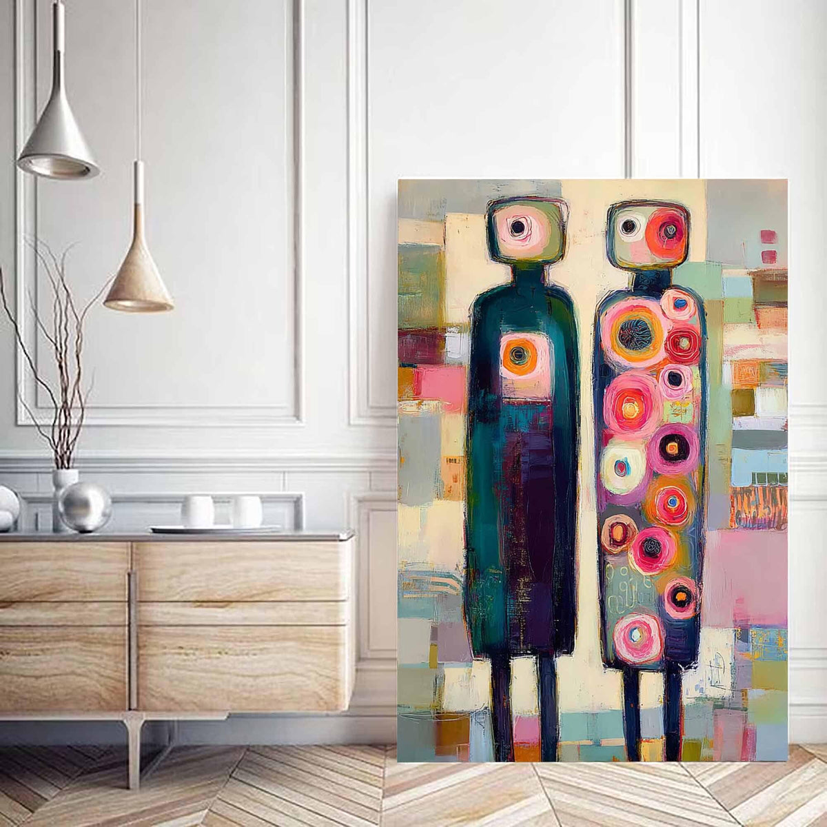 May include: A rectangular canvas painting featuring two stylized figures standing side by side. The left figure is dark blue with a single central orange circle. The right figure is covered in numerous colorful circles in pink, red, and orange.