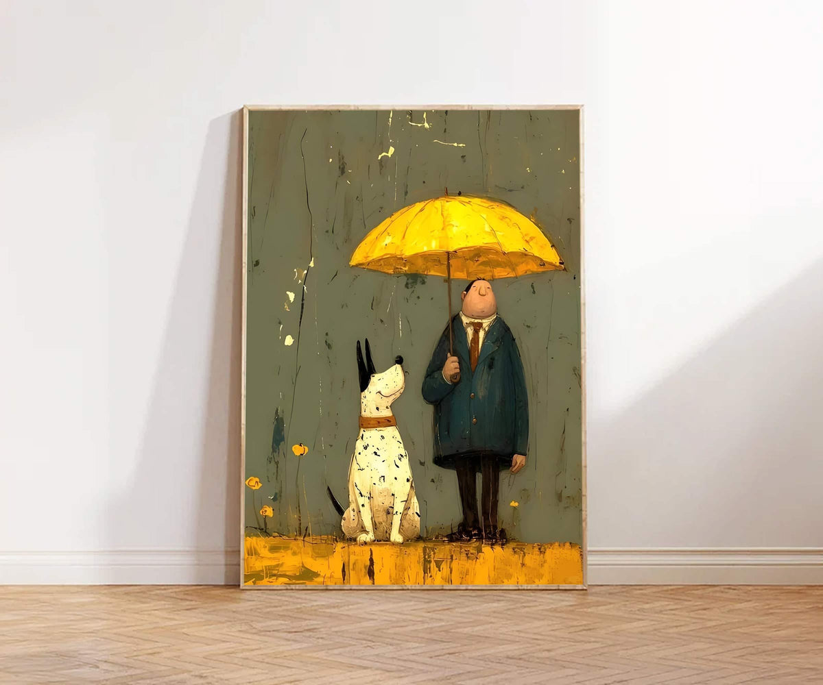 May include: A framed art print depicts a man and a dog under a yellow umbrella. The man wears a blue coat and the dog is white with black spots. The background is a muted green with yellow accents, and the artwork is set against a wooden floor.