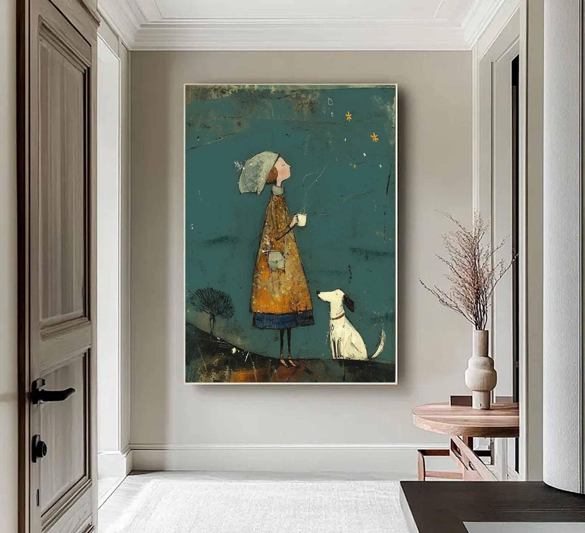 May include: An artistic painting depicts a person in a long orange coat and hat, holding a cup, with a white dog. The background is teal with stars. The artwork is displayed in a hallway with a wooden door and table.