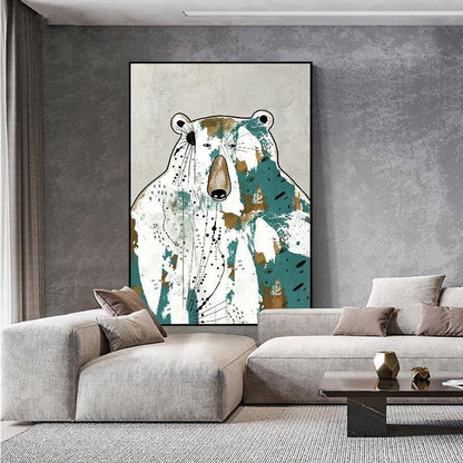 May include: Abstract bear art print with a black frame. The bear is depicted with white, teal, and brown brushstrokes on a light gray background. The artwork is displayed in a modern living room setting.