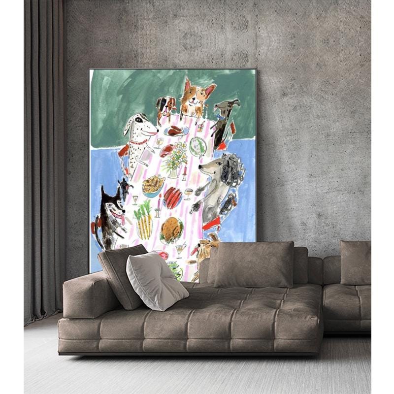 May include: A colorful artwork depicts a dining scene with various dog breeds gathered around a table laden with food and drinks. The painting features a blue and green background, with the dogs rendered in a whimsical, illustrative style. The artwork is displayed above a brown sectional sofa.