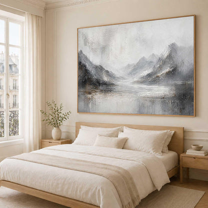 May include: A large rectangular landscape painting featuring a mountain range and a body of water in shades of gray, white, and muted brown. The artwork has a textured, abstract style with visible brushstrokes and is framed in a light wood frame.