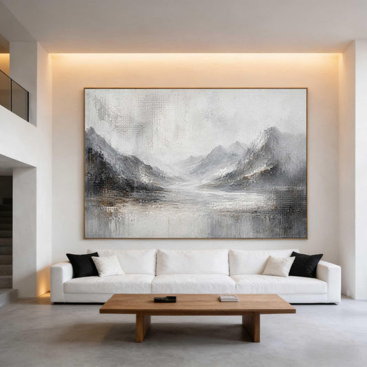 May include: A large rectangular wall art piece featuring an abstract landscape painting in shades of gray, white, and black. The artwork depicts textured mountain ranges and a central valley area with visible brushstrokes and a layered paint application.