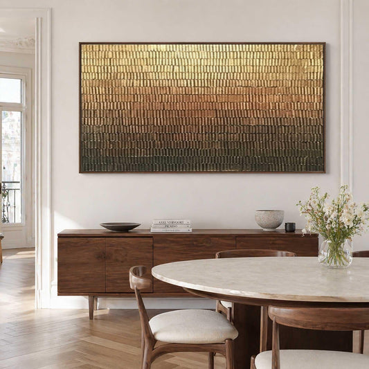 May include: A large rectangular wall art piece featuring a textured gradient pattern that transitions from a bright metallic gold at the top to a deep dark brown at the bottom, composed of numerous small vertical brushstrokes in a uniform grid.