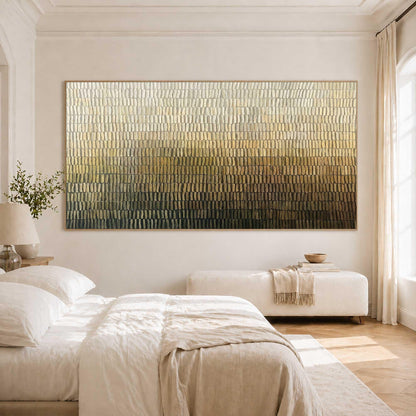 May include: A large rectangular wall art piece featuring a textured gradient pattern of vertical brushstrokes. The colors transition from a light cream and beige at the top, through shades of gold and bronze, to a deep dark brown at the bottom edge.
