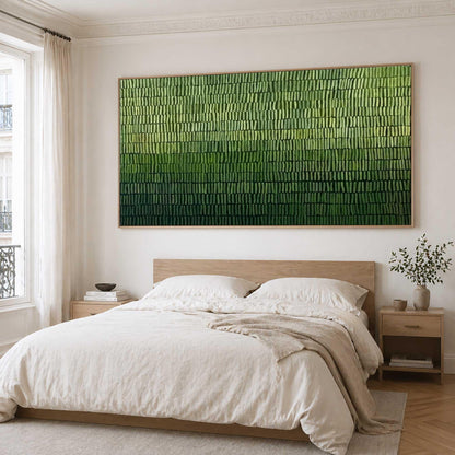 May include: A large rectangular wall art piece featuring a textured, vertical brushstroke pattern in a gradient of green shades, transitioning from light lime green at the top to a deep, dark forest green at the bottom, framed in a light wood frame.