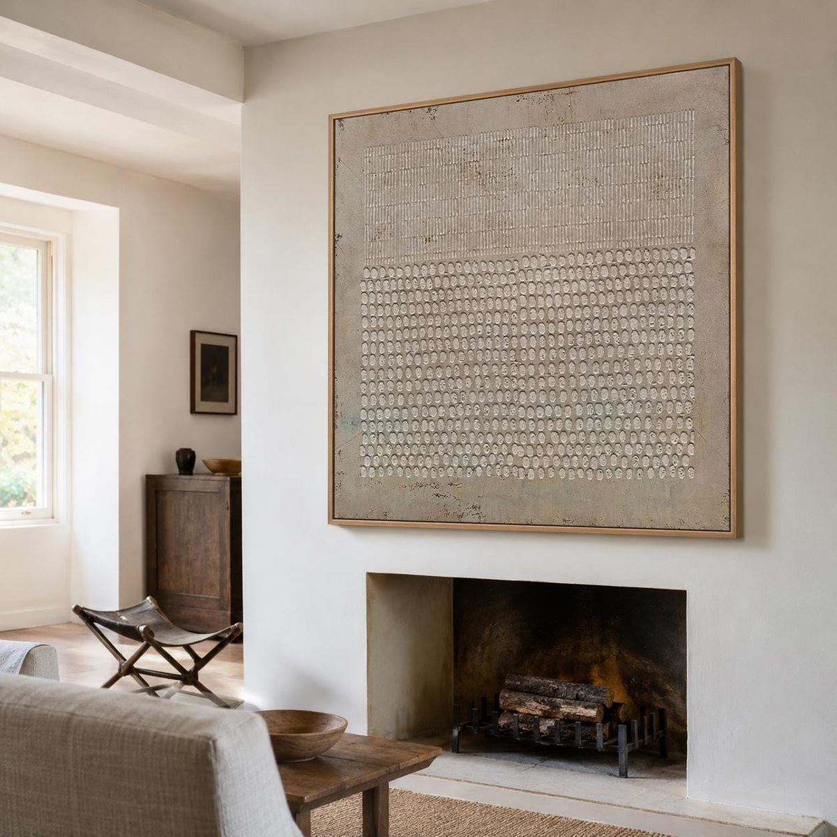May include: A large square wall art piece in a light wooden frame featuring a beige textured background. The upper section displays a grid of vertical lines, while the lower section consists of a dense pattern of small, raised circular shapes.
