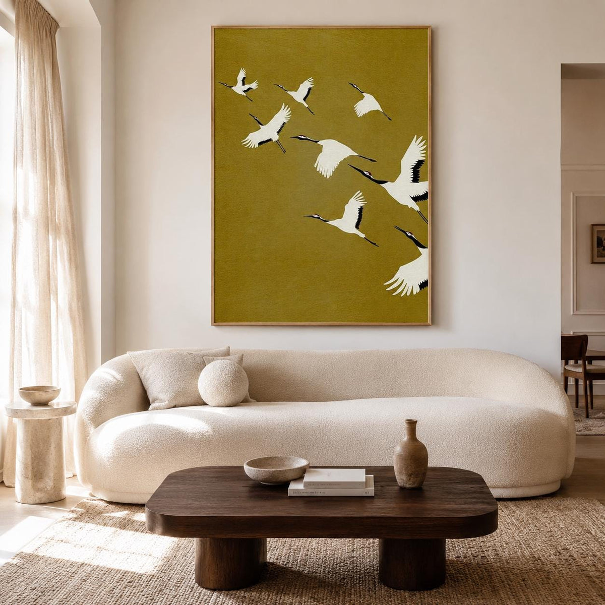 May include: A rectangular wall art print featuring a flock of white cranes with black wingtips and red crowns flying across a solid mustard yellow background. The birds are depicted in various positions of flight, creating a sense of movement.