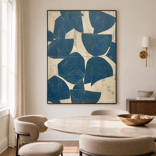 May include: A rectangular wall art piece featuring a series of deep blue, semi-circular and organic shapes layered over a textured, off-white background. The artwork is enclosed in a thin black frame and displays a high-contrast abstract composition.