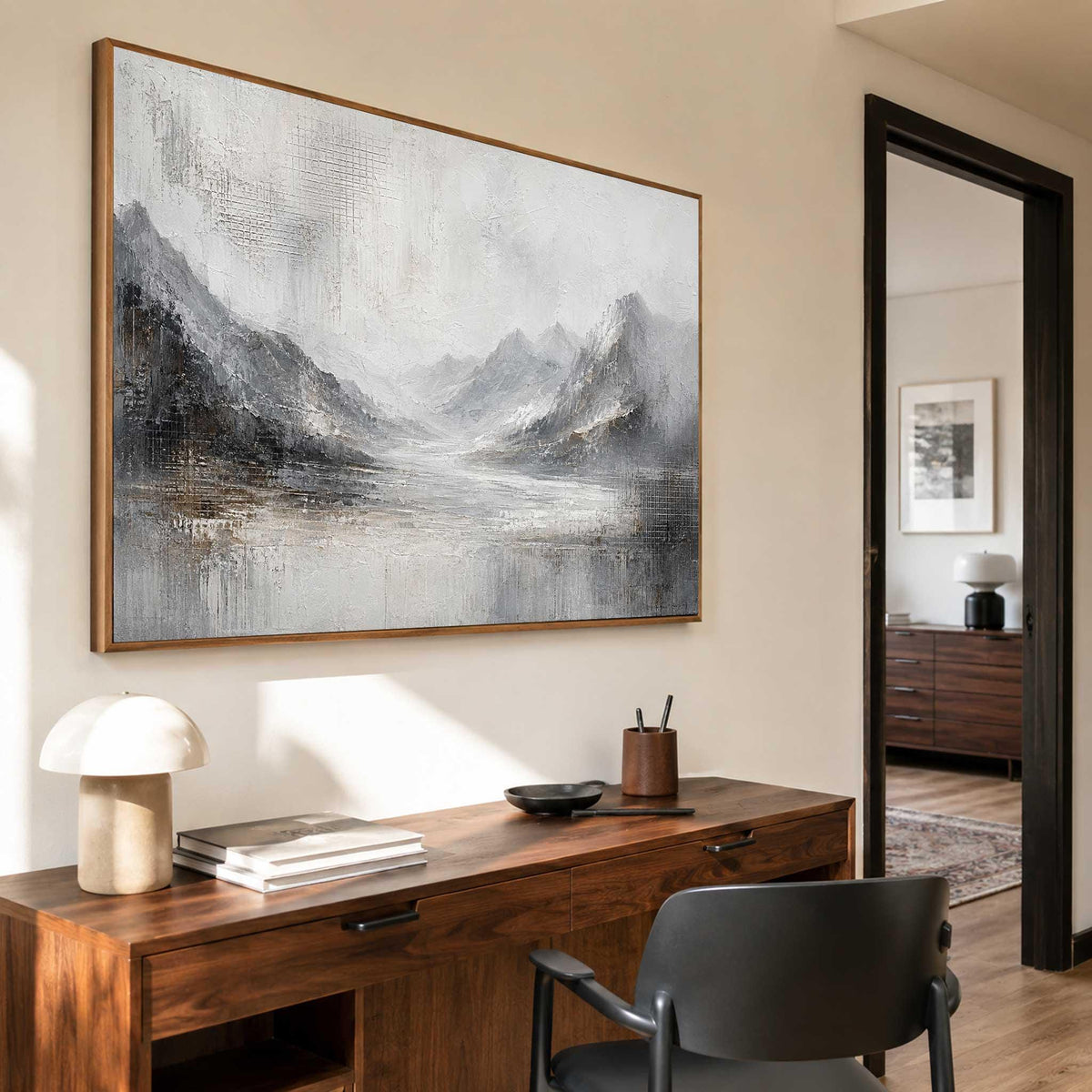 May include: A large rectangular wall art piece featuring an abstract landscape painting with textured brushstrokes in shades of white, gray, charcoal, and muted brown, depicting a mountain range overlooking a calm body of water in a wooden frame.