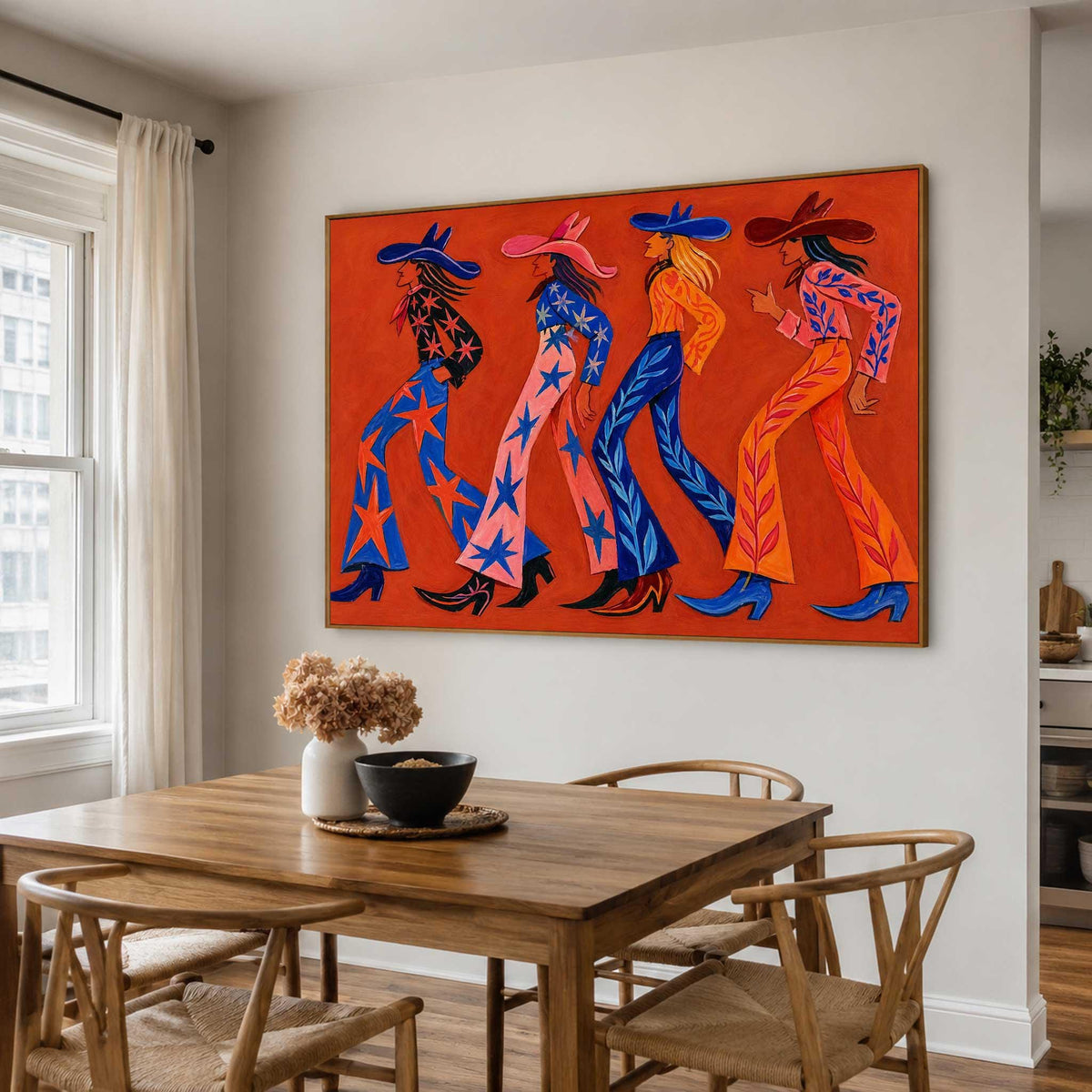 May include: A rectangular wall art print featuring four stylized figures walking in a line against a solid orange background. Each figure wears a wide-brimmed hat, a long-sleeved top, flared trousers with star or leaf patterns, and pointed boots in vibrant colors.